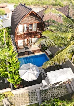 Explore luxury and tranquility at this tropical villa in Bali, featuring a private pool and lush gardens.